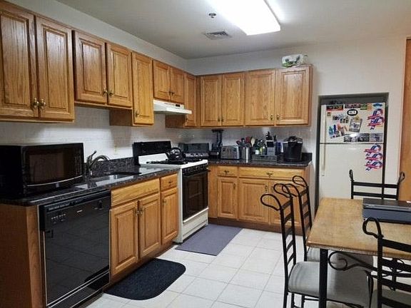 Spacious Kitchen with Granite Countertops
