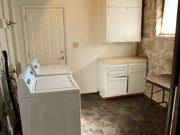 Laundry Room with W/D and storage