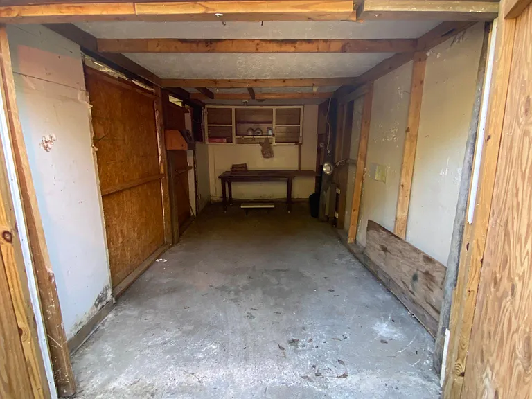 Private shed access; use for storage or parking for a small car.