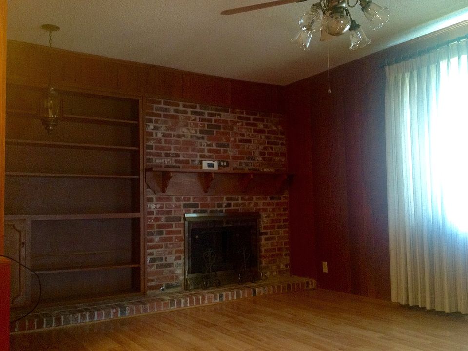 Den with fireplace