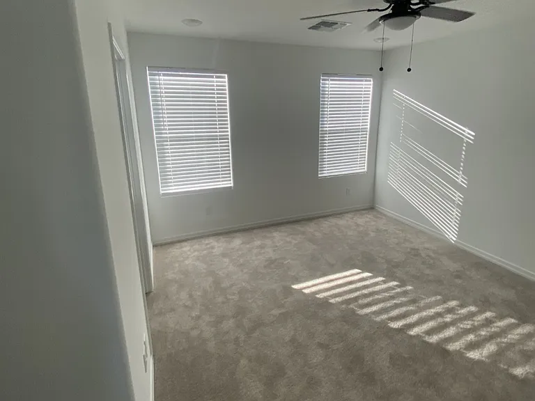 Master Bedroom with Blinds & Fan