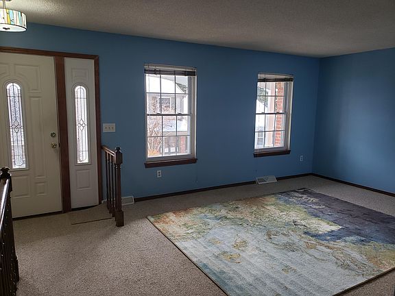 Natural light fills the living room through the West facing windows. Recessed lights also in this room.