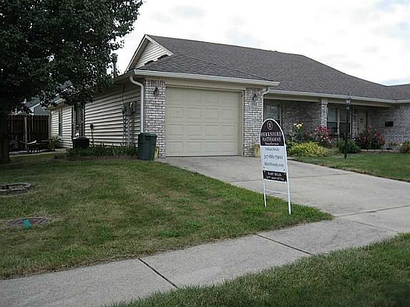 Exterior Front. Side view of corner lot