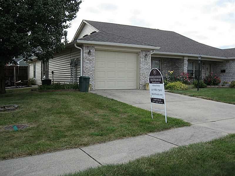 Exterior Front. Side view of corner lot