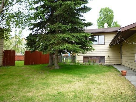 Large Front Yard and Enviting Entrance