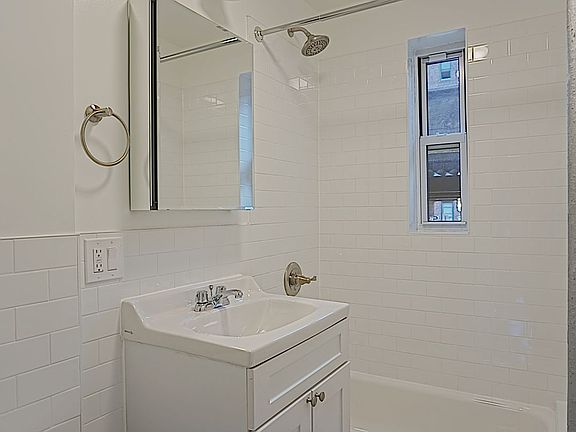 4th image of 3432 91st St APT D11