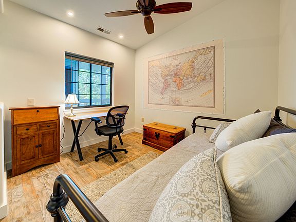 The den offers a comfortable working area.