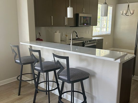 Another view of the kitchen with updated appliances