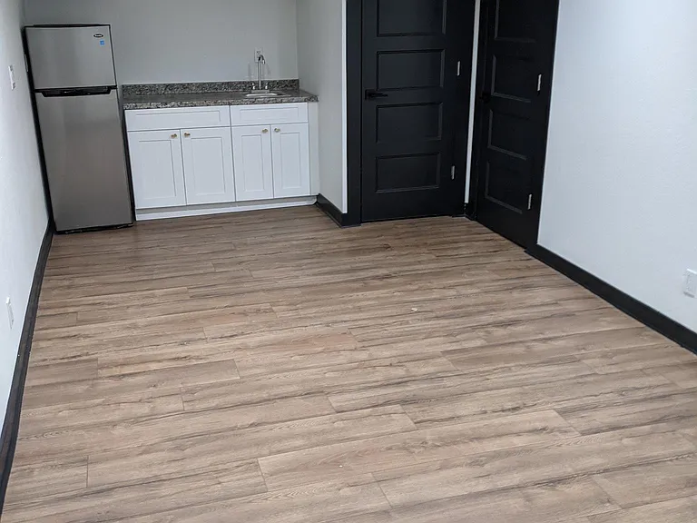 downstair bedroom/ studio with a dry kitchen.