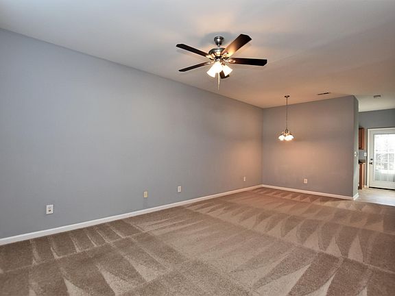 Living room and entrance to kitchen.