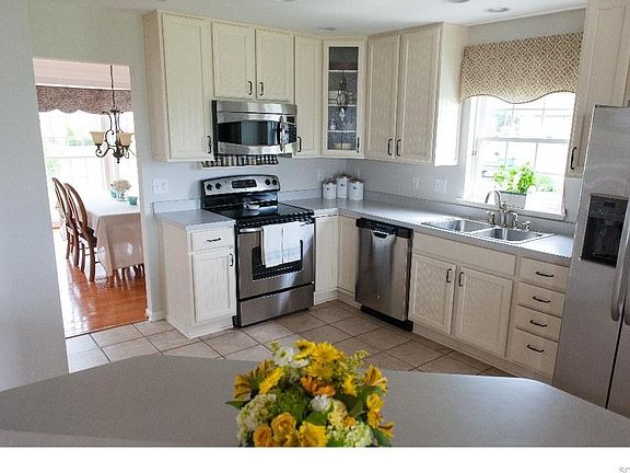 Looking Over the Island to Large Kitchen--Formal Dining Room Beyond