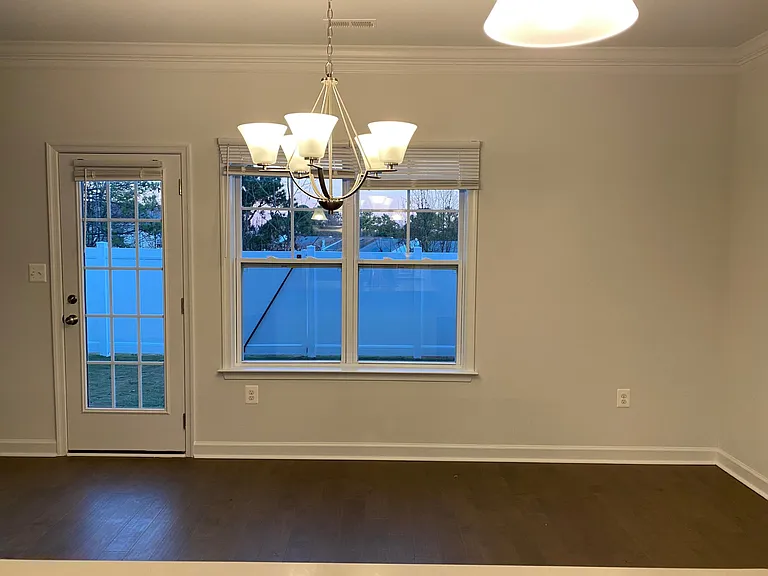 Breakfast room with access to backyard