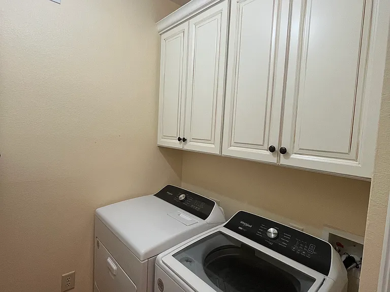 In-unit laundry room. Tons of storage