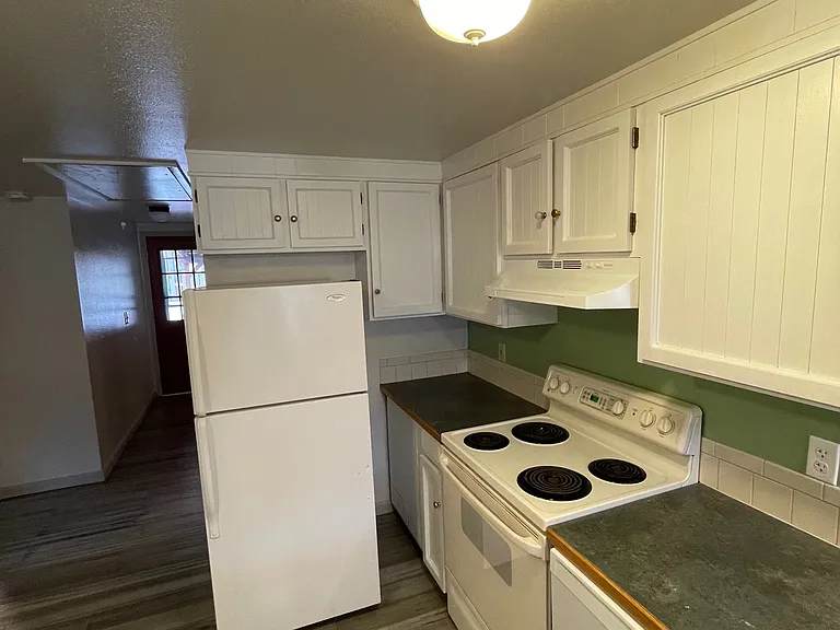 Cozy kitchen with good prep space.