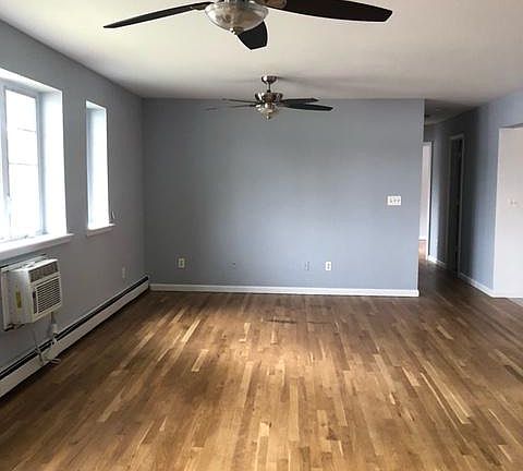 Open living space upon walking into apartment