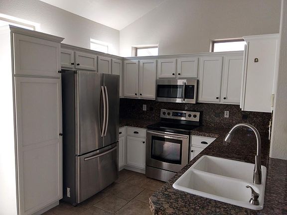 2nd image of 9827 E Empress Ave