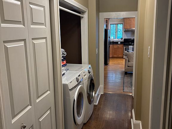 washer & dryer in main hallway closet
