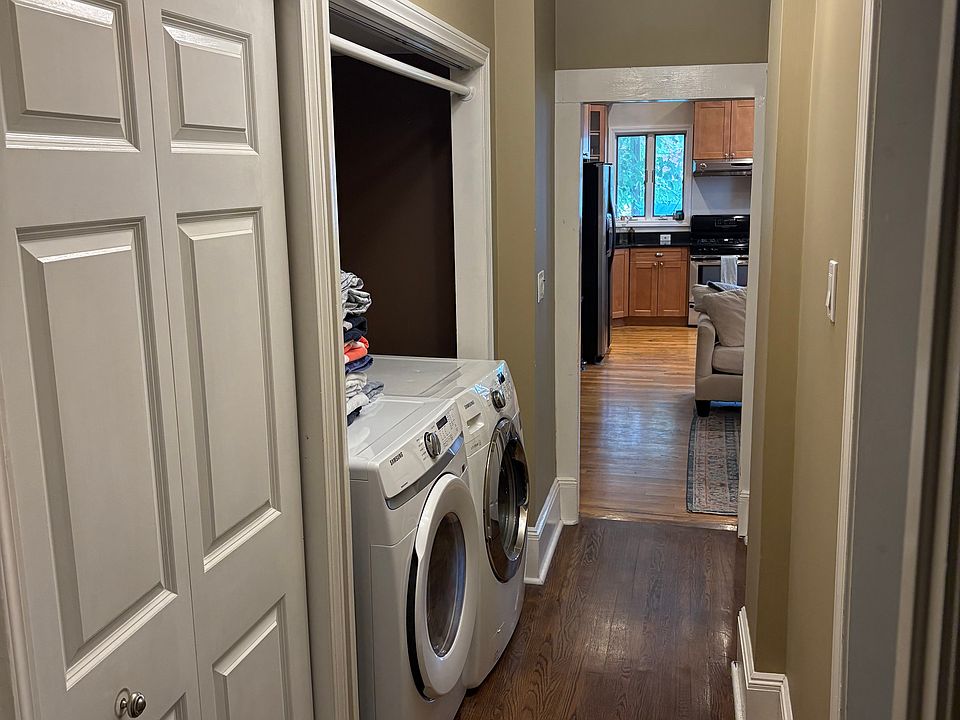 washer & dryer in main hallway closet