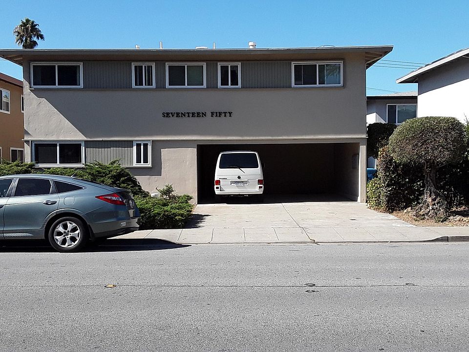 Nicely maintained apartment complex. Two carports in front with three other carport parking spaces behind the unit.