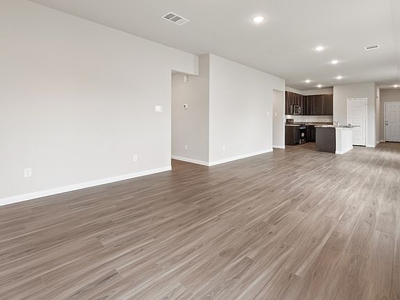 Family Room to Dining Area and Kitchen