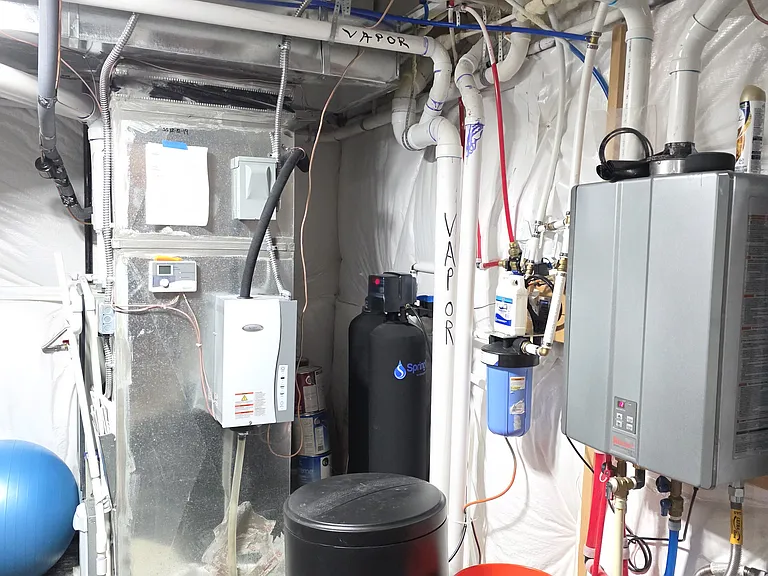 HVAC with AprilAire whole house Air purifier, humidifier, UV Filter, Rennai Tankless water heater, SpringWell water softener located in basement.
