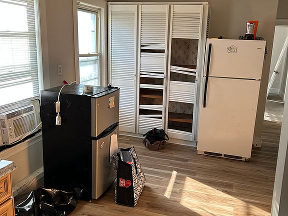 Kitchen. Features Refrigerator, Stove, microwave, food pantry and ample cabinet space