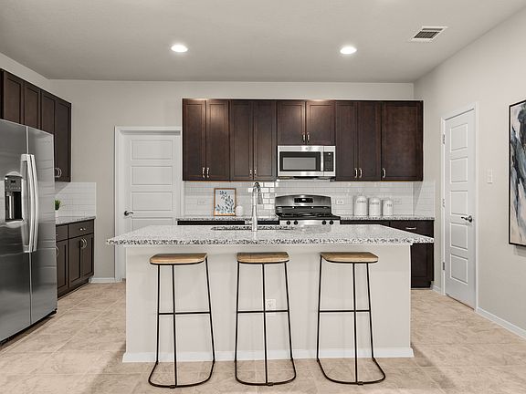 Modern, open kitchen with plenty of storage (including a pantry) and counter space