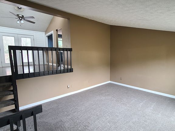 Living Room with vaulted ceilings