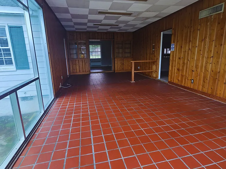 Open-concept space with beautiful natural light and outdoor access.