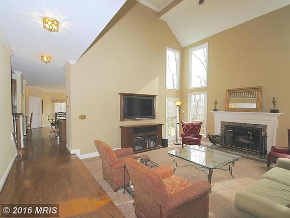 Two story family room w/ FP
