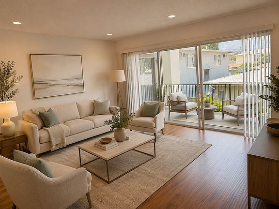 Large living room with large balcony that serves as another room outside@