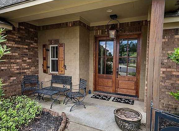 Front view, lot is a cul-de-sac, tree shaded and large lot.