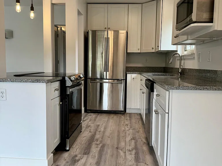 New stove, dishwasher, stainless fridge and microwave, granite counters