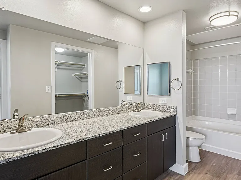 A modern and elegant bathroom at Addison Keller Springs, designed with residents' comfort in mind.