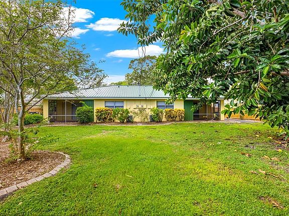 Large spacious yard with ample room for outdoor recreation and grilling