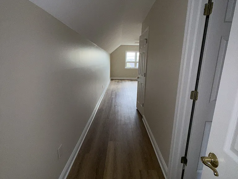 Looking into upstairs master suite from loft