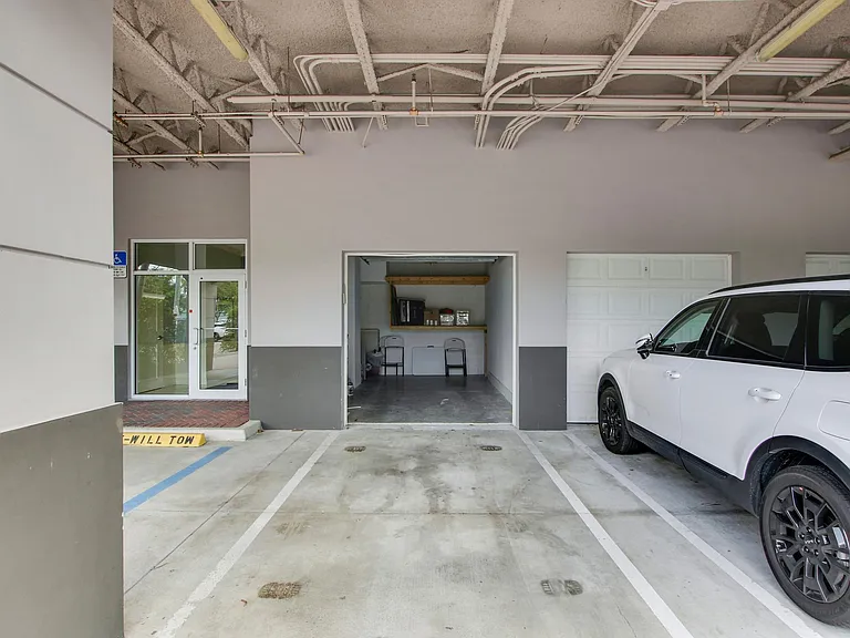 private garage and covered parking, plus additional parking for guests