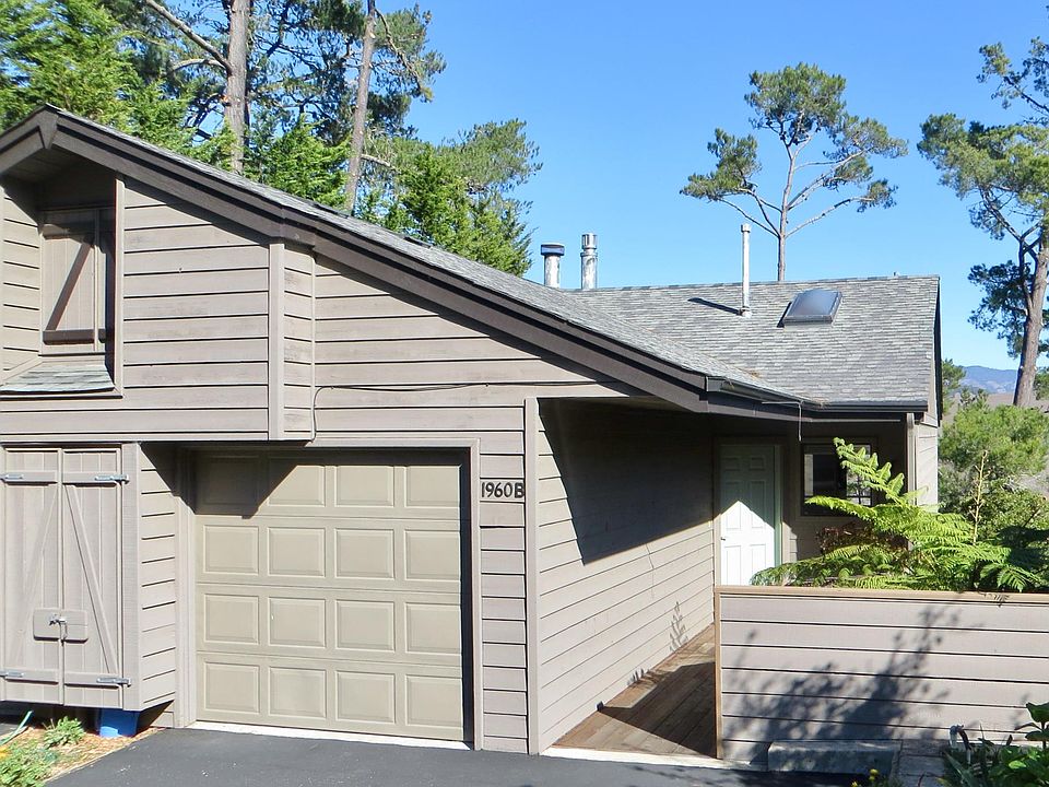Main entry deck and single garage