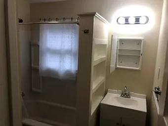 Bathroom with plenty of storage and shelf space