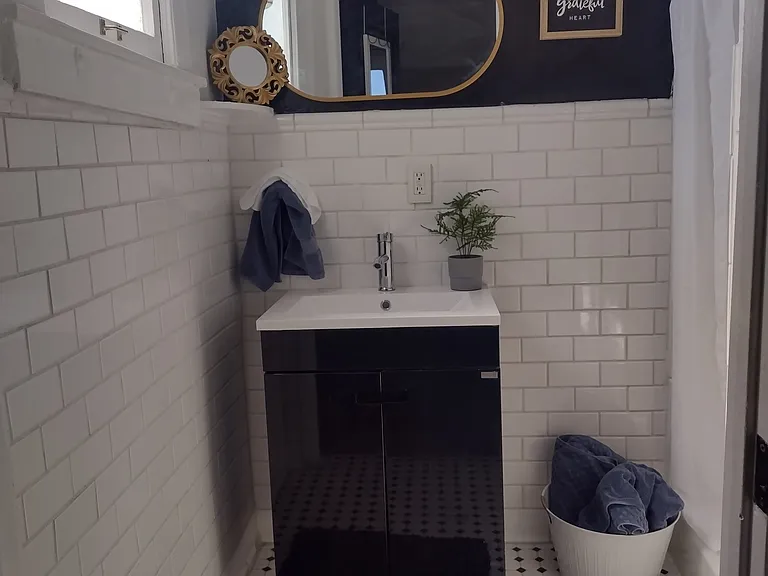 bathroom with shower and toilet
