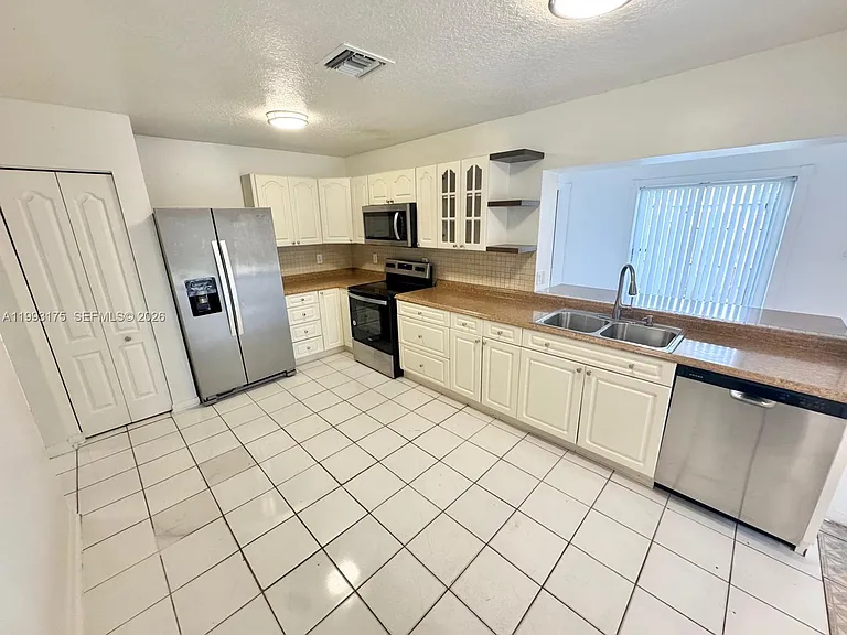 12695 SW 144th Ter — Photo 38