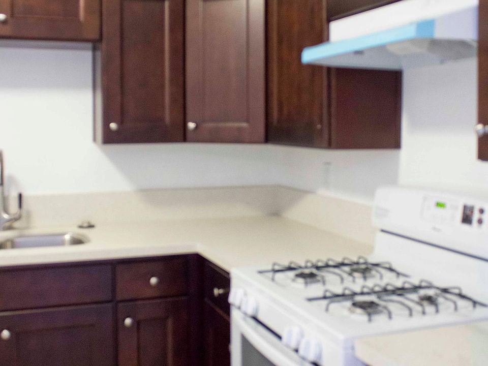 remodeled kitchen, with new quartz countertops, cabinets, st