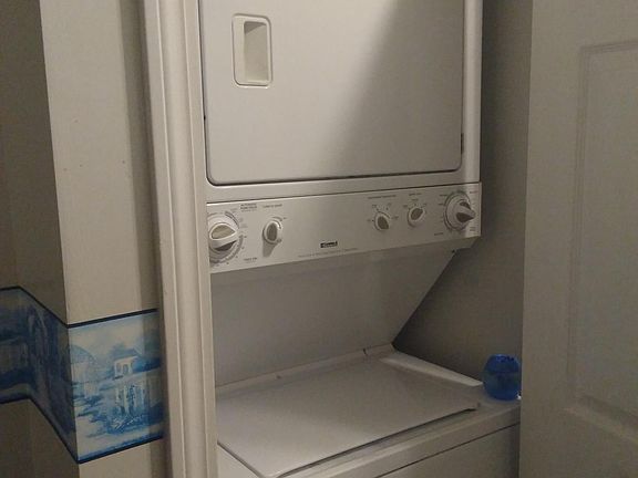 In unit stackable washer and dryer included.