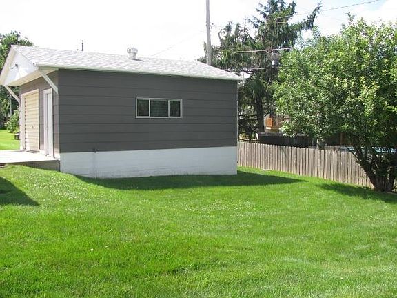 Garage exterior (note: tree has been removed)