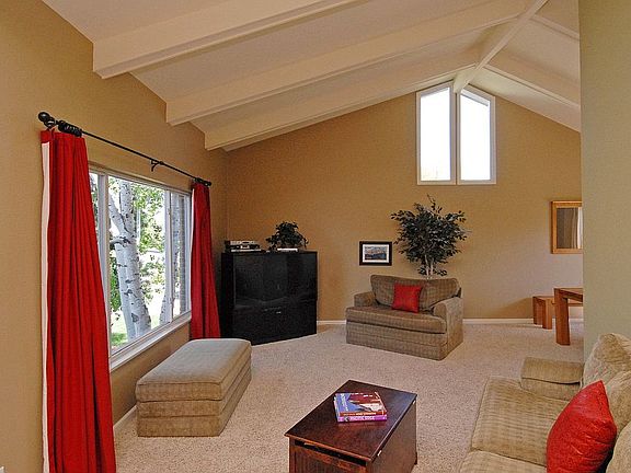 Lg living room w/loads of natural light.