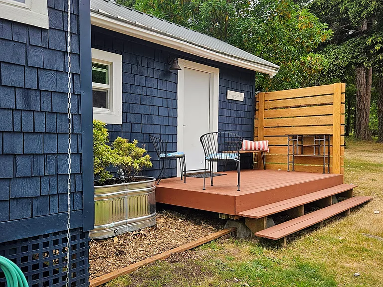 Back deck. Door to bedroom area.