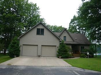 Front of home with 2 car attached garage