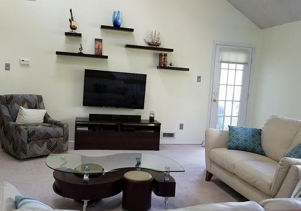 living room with balcony door