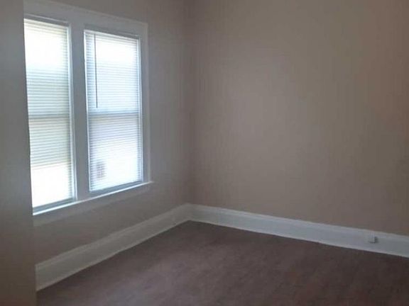 Bedroom 2 painted hardwood flooring