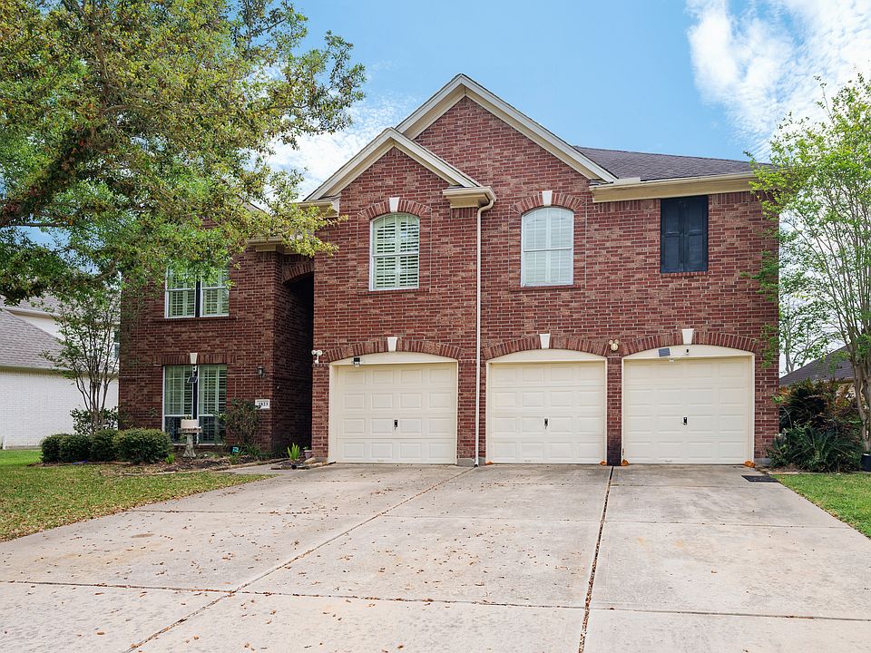 A charming 2-story home with the backyard adjacent to the gulf course